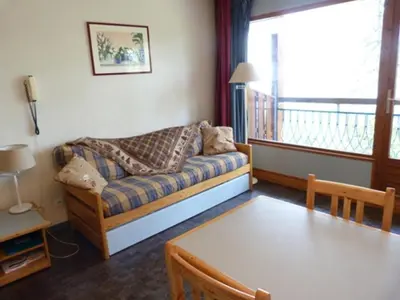 Coin salon dans l'établissement Appartement 2 pièces pour 5 pers., vue vallée, Charmettoger, animaux admis - FR-1-411-231