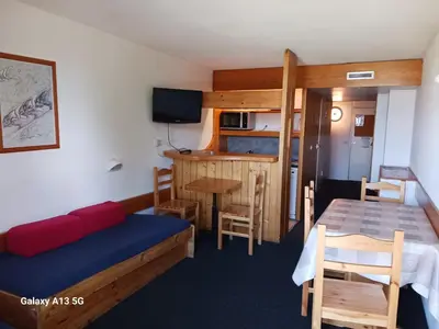 Un ou plusieurs lits dans un hébergement de l'établissement Studio 5 pers, skis aux pieds, près commerces, animaux admis, Arc 1800 - FR-1-411-243