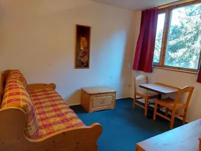 Un ou plusieurs lits dans un hébergement de l'établissement Studio cosy pour 2 aux Arcs 1800, accès wifi, parking optionnel - FR-1-411-304