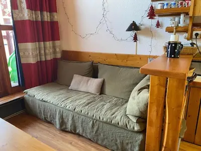 Coin salon dans l'établissement Charmant duplex pour 6 à Arc 1800, proche pistes, avec balcons sud/nord - FR-1-411-179