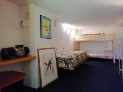 Un ou plusieurs lits dans un hébergement de l'établissement Studio duplex 5 pers. avec balcon exposé Sud-Ouest aux Arcs 1800 - FR-1-411-209