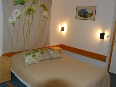Un ou plusieurs lits dans un hébergement de l'établissement Duplex 2 pièces, 6 pers., ski aux pieds, Arc 1800, animaux admis - FR-1-411-219