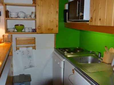 Cuisine ou kitchenette dans l'établissement Duplex 2 pièces, 6 pers., ski aux pieds, Arc 1800, animaux admis - FR-1-411-219