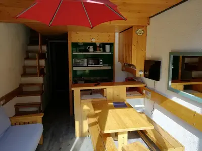 Coin salon dans l'établissement Duplex 2 pièces pour 5 pers. proche pistes à Arc 1800, animaux admis - FR-1-411-238