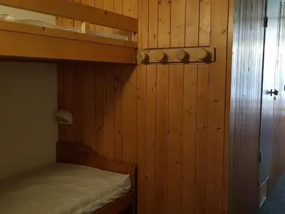 Un ou plusieurs lits dans un hébergement de l'établissement Appartement skis aux pieds pour 7 personnes, animaux admis, Les Arcs 1800 - FR-1-411-240