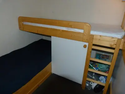 Un ou plusieurs lits dans un hébergement de l'établissement Duplex skis aux pieds pour 5 pers. à Charmettoger avec WIFI - FR-1-411-287