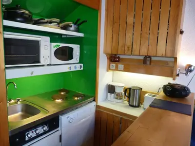 Cuisine ou kitchenette dans l'établissement Duplex skis aux pieds pour 5 pers. à Charmettoger avec WIFI - FR-1-411-287