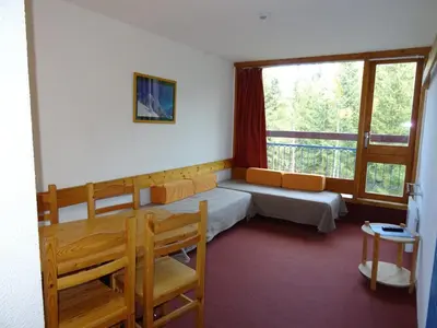 Un ou plusieurs lits dans un hébergement de l'établissement Studio cosy pour 4 pers, au cœur des Arcs 1800, balcon exposé Nord-Est, animaux admis - FR-1-411-321