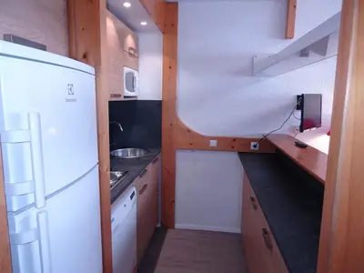 Cuisine ou kitchenette dans l'établissement Appartement duplex 8 pers, skis aux pieds, animaux acceptés - FR-1-411-383