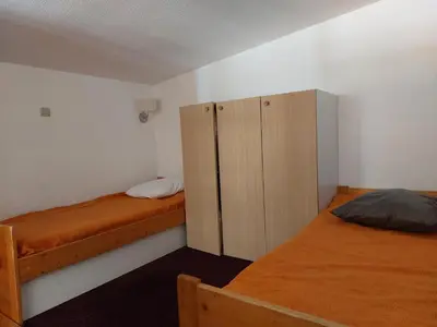 Un ou plusieurs lits dans un hébergement de l'établissement Duplex rénové, animaux admis, pour 5 personnes près pistes et commerces - FR-1-411-404