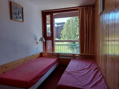 Un ou plusieurs lits dans un hébergement de l'établissement Appartement 2 pièces 6 pers, balcon, animaux admis, WiFi, Arc 1800 - FR-1-411-417