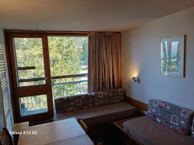 Coin salon dans l'établissement Studio skis aux pieds pour 4 à Arc 1800 - FR-1-411-426