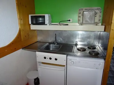 Cuisine ou kitchenette dans l'établissement Studio skis aux pieds, 5 pers., animaux admis – Arc 1800 - FR-1-411-429