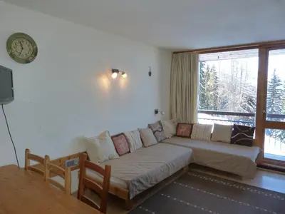 Coin salon dans l'établissement Appartement 2 pièces pour 6, Arc 1800, proche pistes, animaux admis - FR-1-411-148