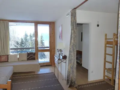 Un ou plusieurs lits dans un hébergement de l'établissement Appartement 2 pièces pour 6, Arc 1800, proche pistes, animaux admis - FR-1-411-148