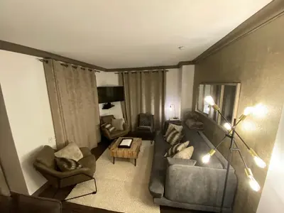 Coin salon dans l'établissement ARC 1950 - APPT 2 CHAMBRES/ 1 COIN NUIT LUXUEUX- SKI AUX PIEDS