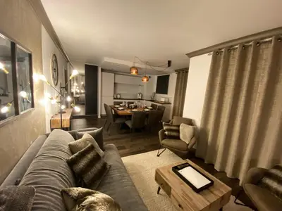 Coin salon dans l'établissement ARC 1950 - APPT 2 CHAMBRES/ 1 COIN NUIT LUXUEUX- SKI AUX PIEDS