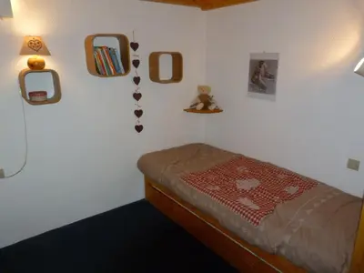 Un ou plusieurs lits dans un hébergement de l'établissement 2 pièces duplex pour 5 pers, Arc 1800. Balcon, wifi inclus. - FR-1-411-132