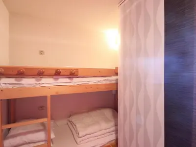 Un ou plusieurs lits dans un hébergement de l'établissement Appartement 4 pers à Vallandry avec balcon et animaux acceptés - FR-1-411-359