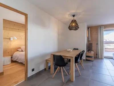 Un ou plusieurs lits dans un hébergement de l'établissement Appartement moderne 3 chambres aux Arcs 1800 - FR-1-352-54
