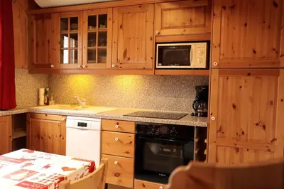 Cuisine ou kitchenette dans l'établissement Le Duplex d'Aussois