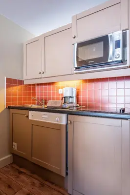 Cuisine ou kitchenette dans l'établissement Résidence Pierre & Vacances Le Belmont