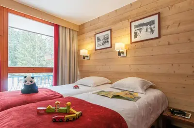 Un ou plusieurs lits dans un hébergement de l'établissement Résidence Pierre & Vacances Le Belmont
