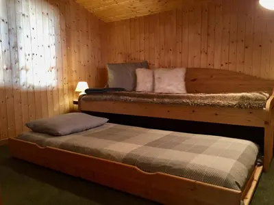 Un ou plusieurs lits dans un hébergement de l'établissement Appartement Val d'Isère 6 personnes avec parking