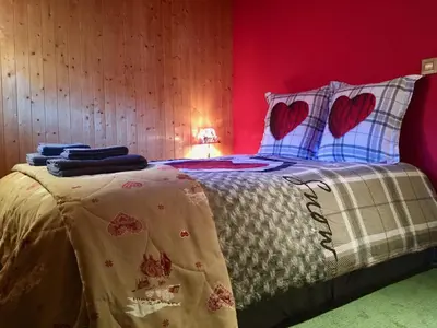 Un ou plusieurs lits dans un hébergement de l'établissement Appartement Val d'Isère 6 personnes avec parking