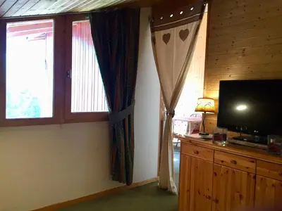 Télévision ou salle de divertissement dans l'établissement Appartement Val d'Isère 6 personnes avec parking