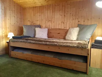 Un ou plusieurs lits dans un hébergement de l'établissement Appartement Val d'Isère 6 personnes avec parking