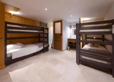 Un ou plusieurs lits dans un hébergement de l'établissement CHALET ALOUETTE Authentique et confortable Proche commerces et Pistes