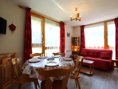 Coin salon dans l'établissement Appartement cosy 4 pers avec balcon et WIFI au pied des pistes - FR-1-508-123