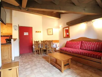 Coin salon dans l'établissement Spacieux appartement 6 pers. au pied des pistes avec parking et WIFI - FR-1-508-129