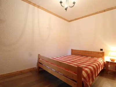Un ou plusieurs lits dans un hébergement de l'établissement Appartement confortable 5 personnes à Val Cenis - proche télécabine et ESF - FR-1-508-144