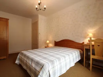 Un ou plusieurs lits dans un hébergement de l'établissement Appartement spacieux 5 pers avec balcon et wifi à Lanslebourg - FR-1-508-146