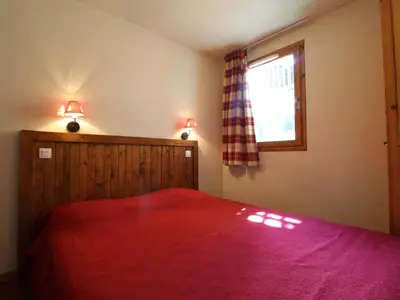 Un ou plusieurs lits dans un hébergement de l'établissement Appartement à Val-Cenis - 4 pers, pied des pistes, piscine, balcon, parking, WiFi gratuit - FR-1-508-149