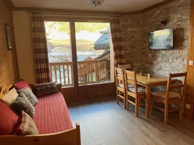 Télévision ou salle de divertissement dans l'établissement Appartement cosy 4 pers, pieds des pistes et piscine, Val-Cenis - FR-1-508-186