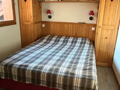 Un ou plusieurs lits dans un hébergement de l'établissement Appartement cosy 4 pers, pieds des pistes et piscine, Val-Cenis - FR-1-508-186