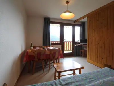 Un ou plusieurs lits dans un hébergement de l'établissement Appartement cosy 4 pers, pied des pistes, balcon, parking, WiFi - FR-1-508-192