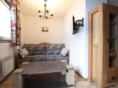 Coin salon dans l'établissement Duplex 10 pers au pied des pistes avec parking, balcon et wifi à Val Cenis - FR-1-508-25