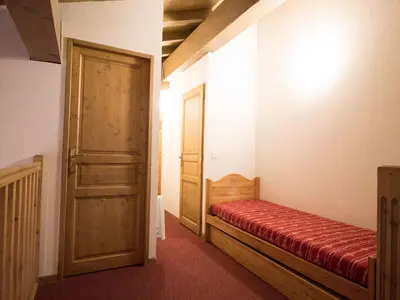 Un ou plusieurs lits dans un hébergement de l'établissement Duplex 10 pers au pied des pistes avec parking, balcon et wifi à Val Cenis - FR-1-508-25