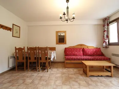 Coin salon dans l'établissement Appartement spacieux 6 pers. au pied des pistes avec parking et WIFI - FR-1-508-34