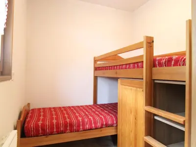 Un ou plusieurs lits dans un hébergement de l'établissement Appartement spacieux 6 pers au pied des pistes avec parking et WIFI - FR-1-508-53