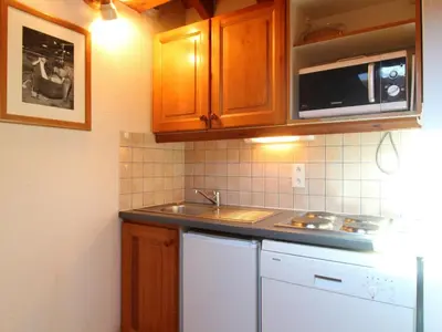 Cuisine ou kitchenette dans l'établissement Appartement 6 pers à Lanslevillard-Val Cenis, proche pistes et commerces - FR-1-508-64