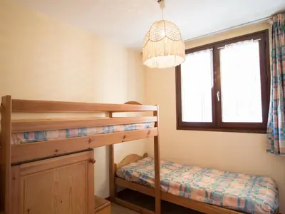 Un ou plusieurs lits dans un hébergement de l'établissement Appartement à Lanslebourg, 7 pers, près des pistes - FR-1-508-98