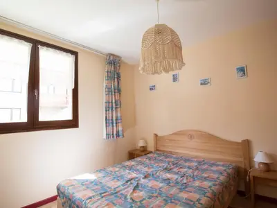 Un ou plusieurs lits dans un hébergement de l'établissement Appartement à Lanslebourg, 7 pers, près des pistes - FR-1-508-98