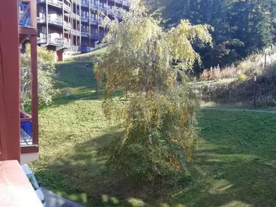 Jardin de l'établissement Duplex 2 pièces pour 5 pers, proche pistes, Arc 1800, animaux admis - FR-1-411-286