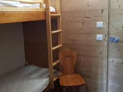 Un ou plusieurs lits dans un hébergement de l'établissement Studio skis aux pieds pour 5 pers, Les Arcs 1800, animaux admis - FR-1-411-475
