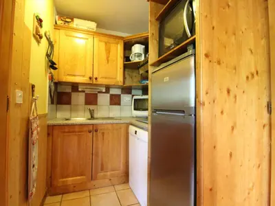 Cuisine ou kitchenette dans l'établissement Appartement 6 pers avec WIFI proche des pistes - FR-1-508-214